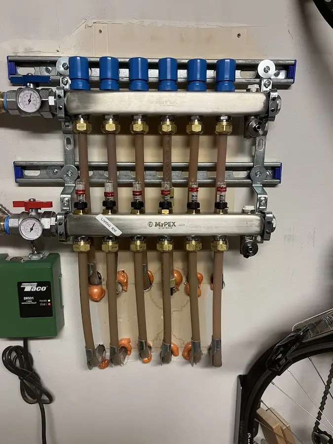 Plumber performing Water Heater Repair at a residential property in Speedway